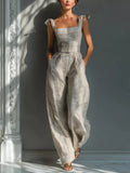 Full Size Striped Wide-Leg Jumpsuit with Tie-Shoulder Detail Plus Size